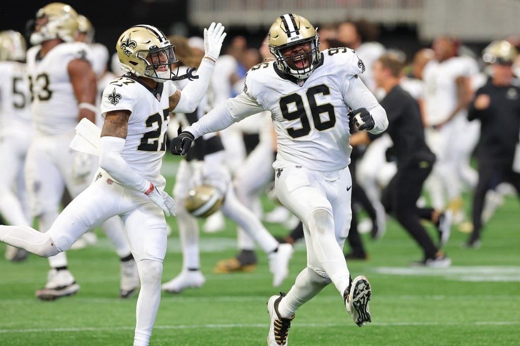 carl granderson alontae taylor new orleans saints celebrate