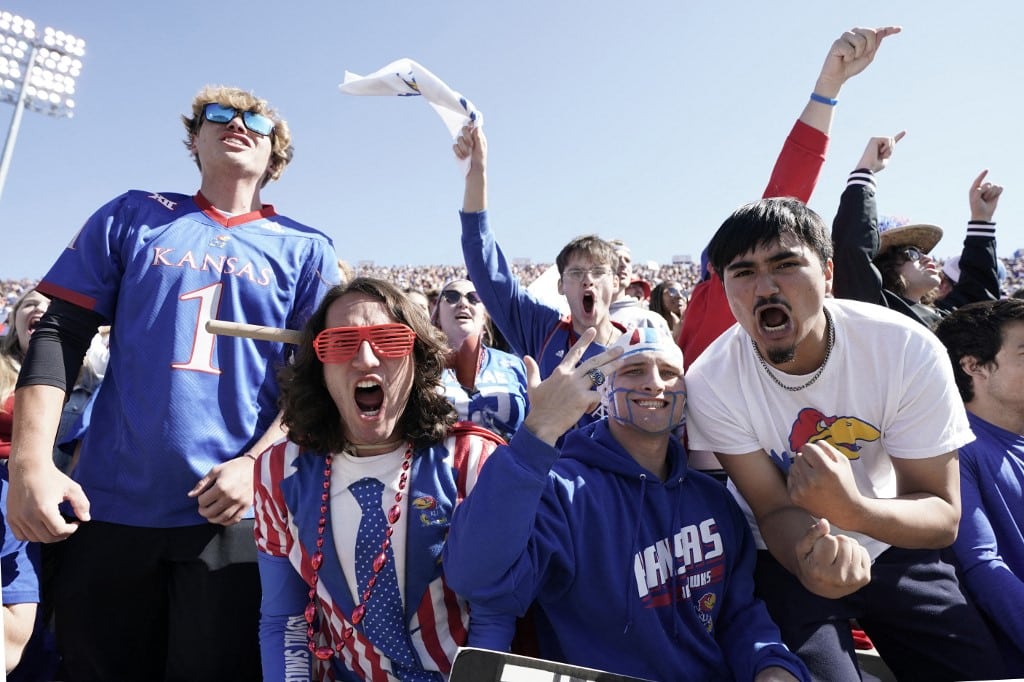 kansas jayhawks fans celebrate ncaa football