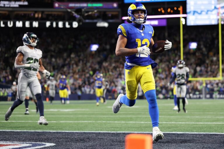 Los Angeles Rams v Seattle Seahawks - NFL 2025 - Oddstrader - Oddstrader The cover for this NFL Odds week 17 article shows Puka Nacua #12 of the Los Angeles Rams scoring a touchdown during overtime against the Seattle Seahawks.