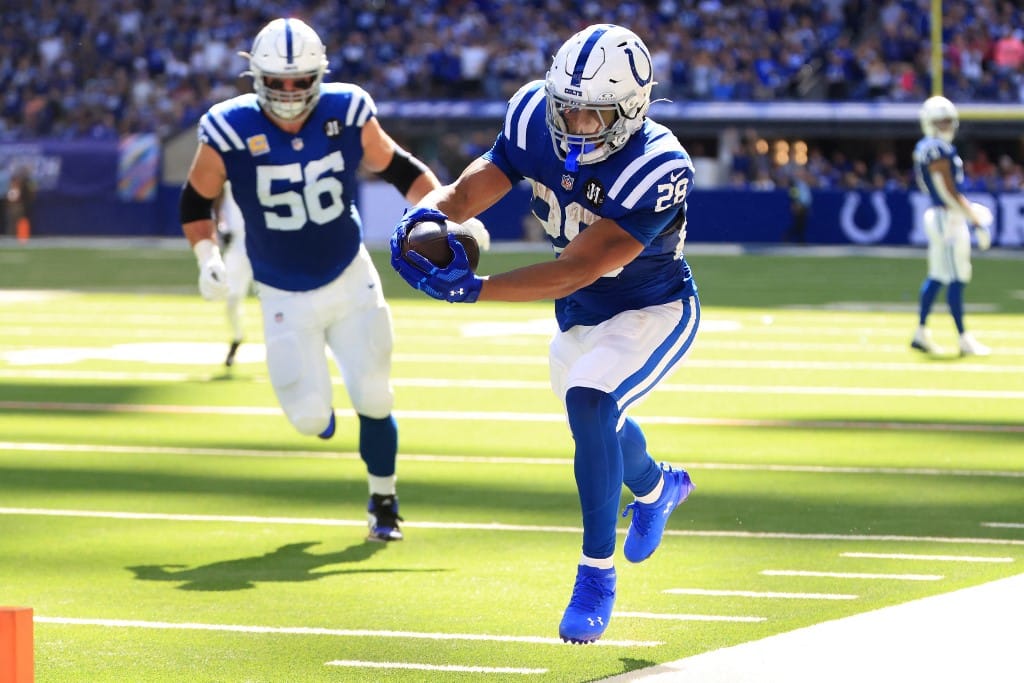 Jonathan Taylor #28 of the Indianapolis Colts runs out of bounds in the game against the Arizona Cardinals