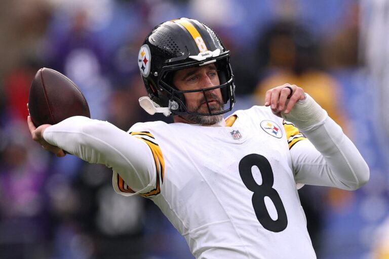 Pittsburgh Steelers v Baltimore Ravens - NFL 2025 - Oddstrader - Oddstrader The cover for this NFL player props week 18 article shows Aaron Rodgers #8 of the Pittsburgh Steelers warming up prior to a game against the Baltimore Ravens.