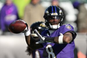Baltimore Ravens v Cincinnati Bengals - NFL 2025 - Oddstrader The cover for this NFL odds Week 18 article shows Lamar Jackson #8 of the Baltimore Ravens warming up prior to a game against the Cincinnati Bengals.
