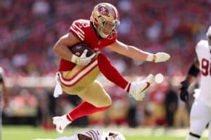 Christian McCaffrey of the San Francisco 49ers runs with the ball against the Arizona Cardinals.