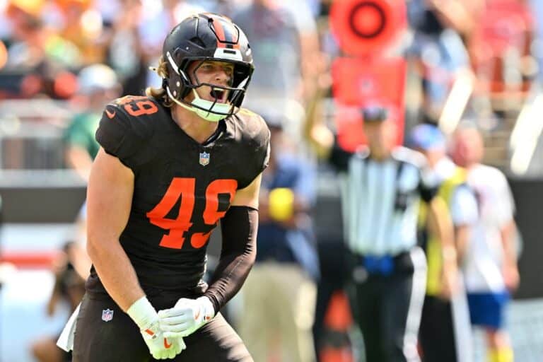 Carson Schwesinger #49 of the Cleveland Browns celebrates after a sack during the second quarter against the Green Bay Packers