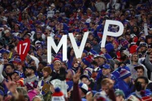Buffalo Bills Fans Hold Signs MVP