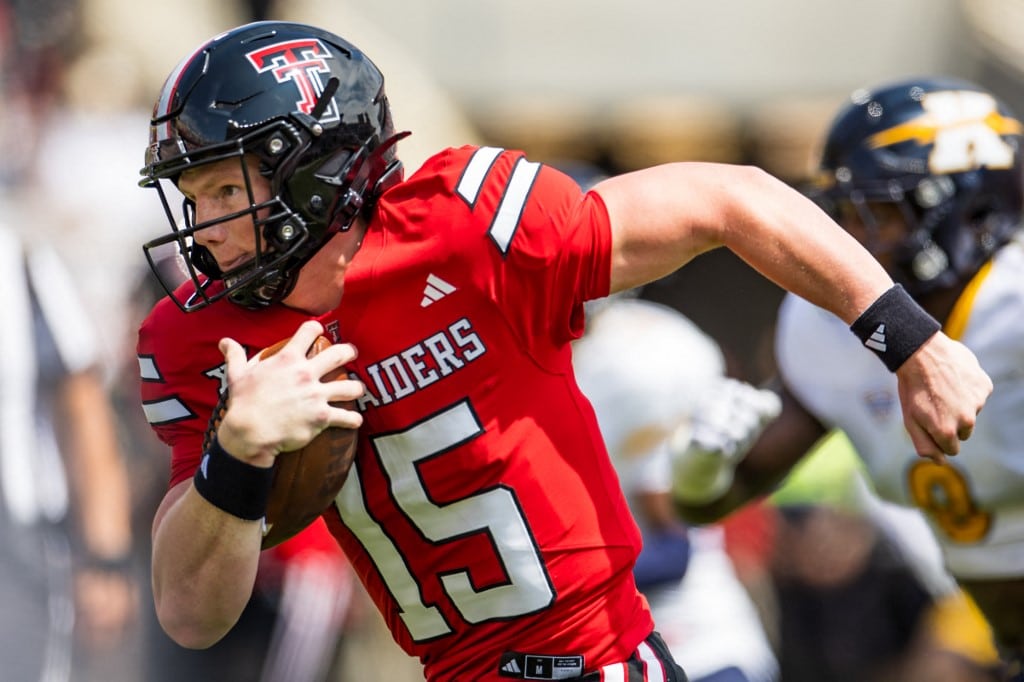 Will Hammond #15 of the Texas Tech Red Raiders runs for a touchdown against the Kent State Golden Flashes