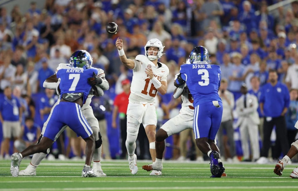 Arch Manning #16 of the Texas Longhorns throws a pass against the Kentucky Wildcats