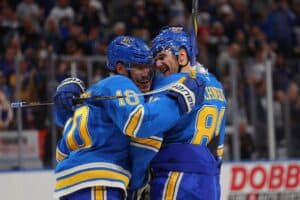Pavel Buchnevich and Brayden Schenn of the St. Louis Blues, one of our NHL picks today, celebrate against the Toronto Maple Leafs.