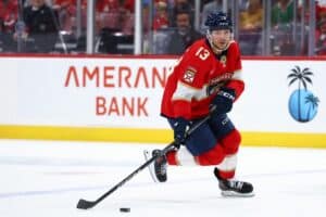 Sam Reinhart #13 of the Florida Panthers skates with the puck against the Washington Capitals.
