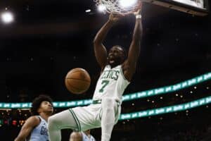 Jaylen Brown #7 of the Boston Celtics dunks against the Memphis Grizzlies.