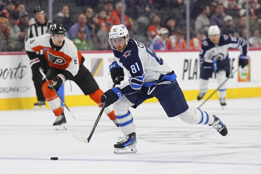 Kyle Connor #81 of the Winnipeg Jets controls the puck against the Philadelphia Flyers in the third period at the Wells Fargo Center on March 6, 2025 in Philadelphia, Pennsylvania. Mitchell Leff/Getty Images/AFP - Oddstrader Blog - Oddstrader Blog Winnipeg Jets v Philadelphia Flyers