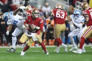Brock Purdy #13 of the San Francisco 49ers looks to pass against the Detroit Lions.