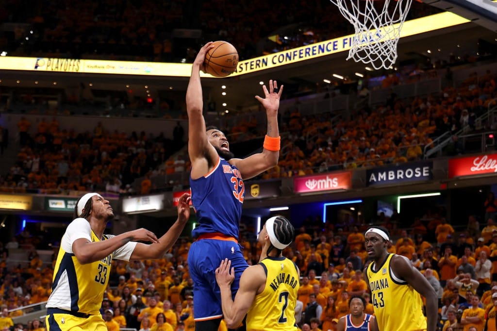 Karl-Anthony Towns #32 of the New York Knicks drives to the basket against the Indiana Pacers.