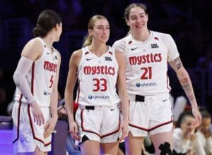 Jade Melbourne #5, Lucy Olsen #33 and Emily Engstler #21 of the Washington Mystics in the second half of play against the Los Angeles Sparks.