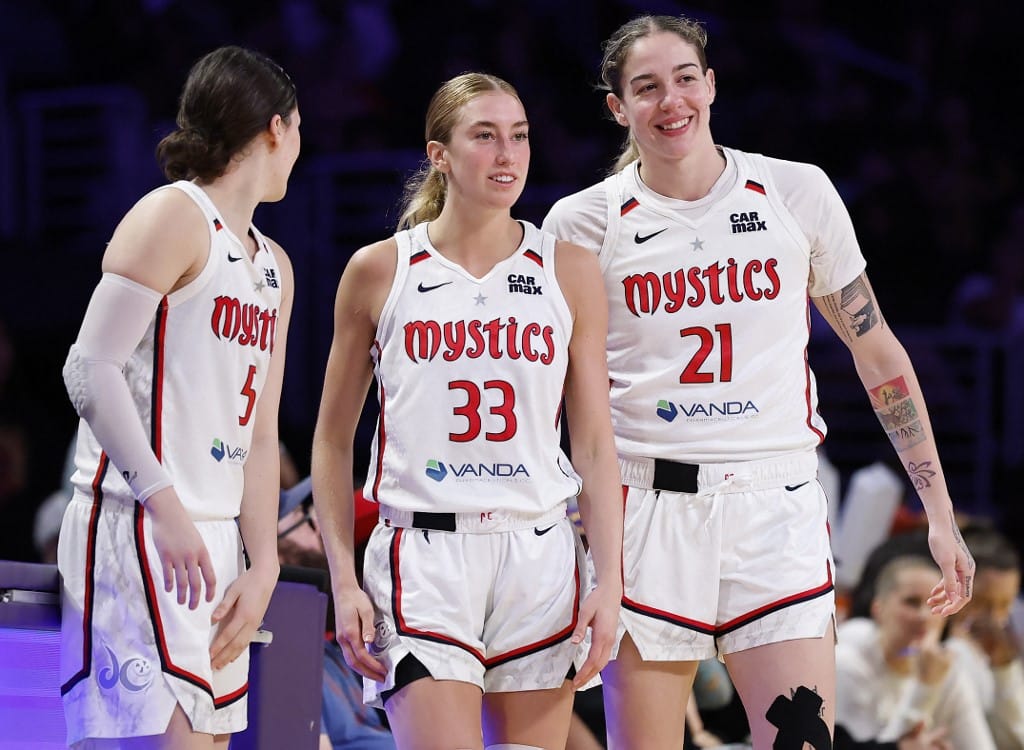 Jade Melbourne #5, Lucy Olsen #33 and Emily Engstler #21 of the Washington Mystics in the second half of play against the Los Angeles Sparks.