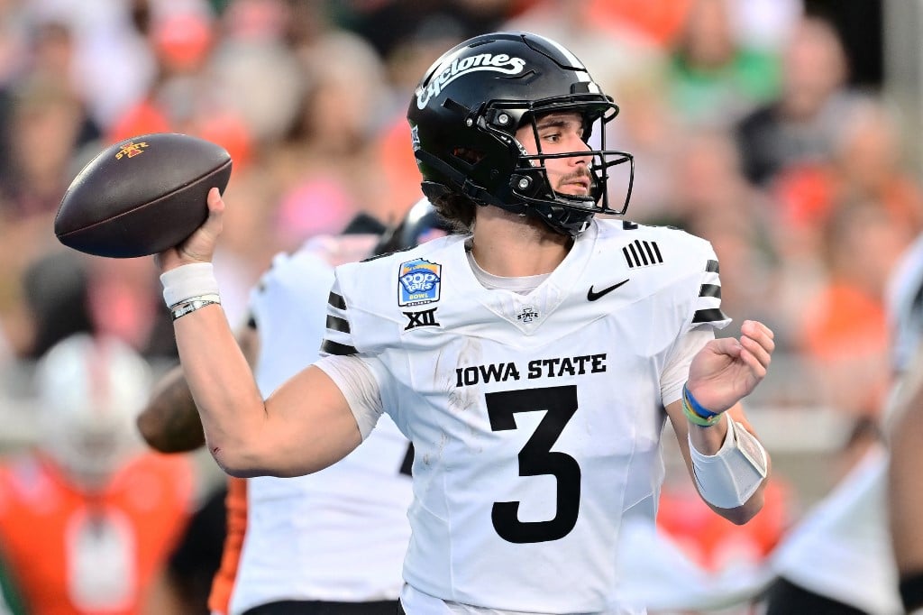 Rocco Becht #3 of the Iowa State Cyclones looks to throw a pass in the second quarter against the Miami Hurricanes.