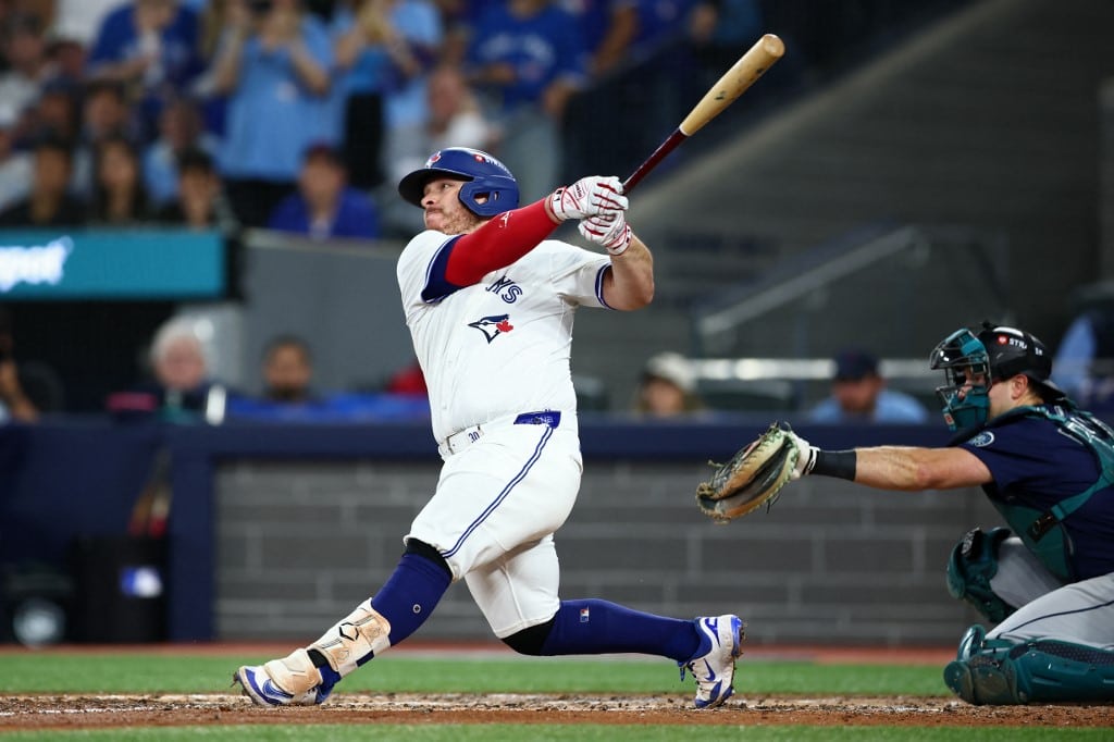 Alejandro Kirk #30 of the Toronto Blue Jays hits a single during the sixth inning against the Seattle Mariners