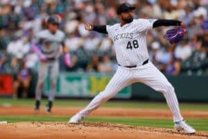Starting pitcher German Marquez #48 of the Colorado Rockies delivers a pitch in the second inning against the Minnesota Twins.