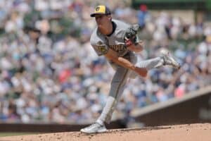 Quinn Priester #46 of the Milwaukee Brewers delivers a pitch against the Chicago Cubs