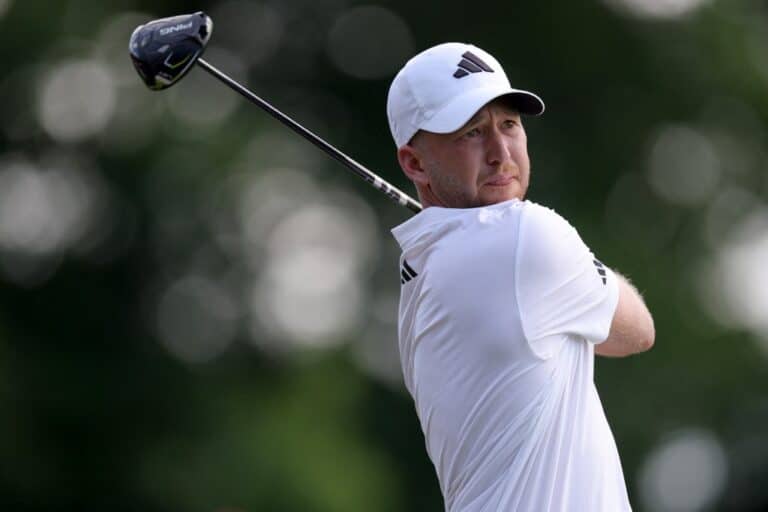 Daniel Berger of the United States plays his shot from the first tee during the second round of the Travelers Championship 2025.