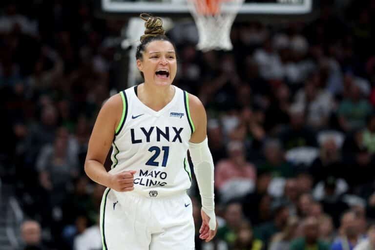 Kayla McBride #21 of the Minnesota Lynx reacts after a basket against the Seattle Storm.