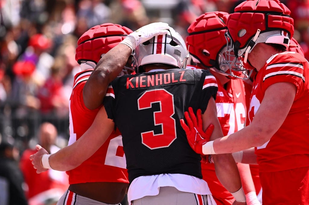 Quarterback Lincoln Kienholz #3 of the Ohio State Buckeyes celebrates with his teammates following a touchdown during the third quarter of the Ohio State Spring Game.