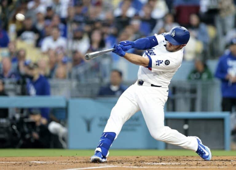 Max Muncy #13 of the Los Angeles Dodgers hits a 2 run home run, to take a 4-1 lead over the New York Mets.