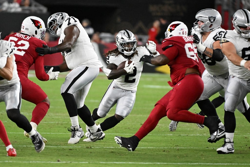 Ashton Jeanty #2 of the Las Vegas Raiders runs with the ball against the Arizona Cardinals during the first quarter of the NFL preseason 2025 game
