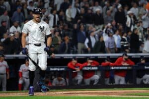 Giancarlo Stanton #27 of the New York Yankees reacts during game three of the American League Wild Card Series against the Boston Red Sox