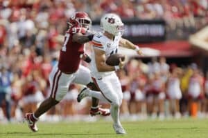 Defensive end Marvin Jones Jr. #97 of the Oklahoma Sooners sacks quarterback Jackson Arnold #11 of the Auburn Tigers