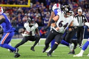 Zay Flowers #4 of the Baltimore Ravens runs the ball against the Buffalo Bills