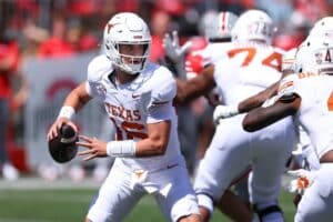 Arch Manning #16 of the Texas Longhorns plays against the Ohio State Buckeyes