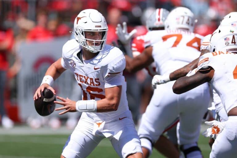 Arch Manning #16 of the Texas Longhorns plays against the Ohio State Buckeyes