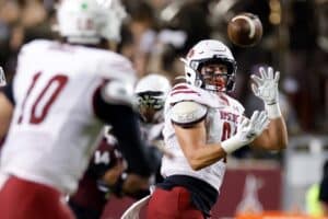 Jerry Lydiatt #86 of the New Mexico State Aggies catches a pass in the second quarter against the Texas A&M Aggies