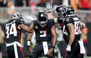 Michael Penix Jr. #9 of the Atlanta Falcons reacts after rushing for a touchdown against the Tampa Bay Buccaneers