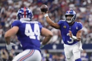 Russell Wilson #3 of the New York Giants makes a pass in the game against the Dallas Cowboys