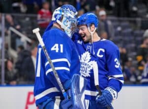Anthony Stolarz #41 and Auston Matthews #34 of the Toronto Maple Leafs celebrate after the 5-2 win against the Montreal Canadiens
