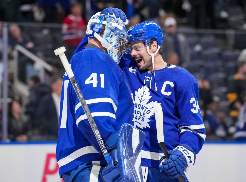 Anthony Stolarz #41 and Auston Matthews #34 of the Toronto Maple Leafs celebrate after the 5-2 win against the Montreal Canadiens