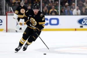 Casey Mittelstadt #11 of the Boston Bruins skates against the Colorado Avalanche