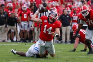 Gunner Stockton #14 of the Georgia Bulldogs is sacked on a two point conversion attempt