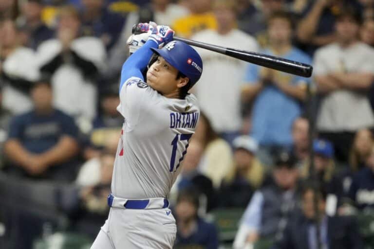 Shohei Ohtani #17 of the Los Angeles Dodgers flies out during the third inning against the Milwaukee Brewers