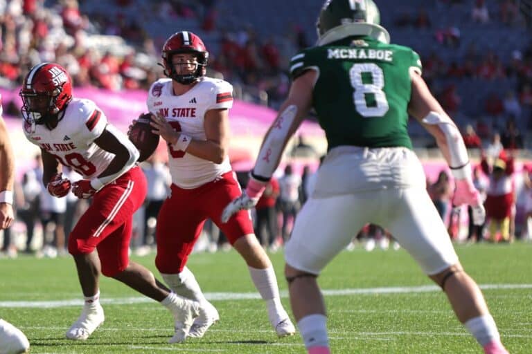 Tyler Huff #6 of the Jacksonville State Gamecocks looks for a pass during the 2024 StaffDNA Cure Bowl game between Jacksonville State Gamecocks and Ohio Bobcats