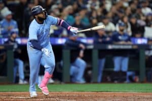 Vladimir Guerrero Jr. #27 of the Toronto Blue Jays hits a solo home run against the Seattle Mariners