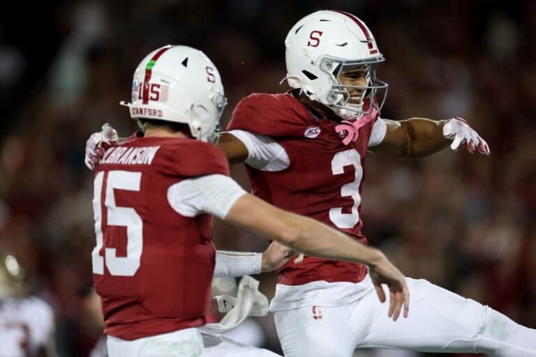 CJ Williams and Ben Gulbranson celebrate after a touchdown against the Florida State Seminoles.