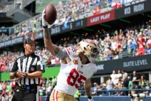 George Kittle #85 of the San Francisco 49ers celebrates a touchdown against the Seattle Seahawks.