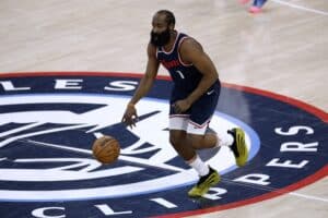 James Harden of the LA Clippers, one of our NBA player props today, dribbles against the Denver Nuggets.