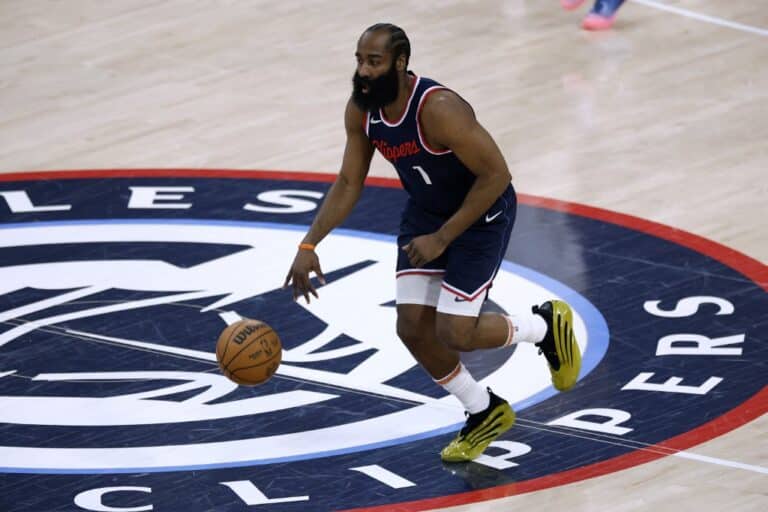 James Harden of the LA Clippers, one of our NBA player props today, dribbles against the Denver Nuggets.