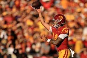 Jayden Maiava #14 of the USC Trojans in action against the Michigan Wolverines.