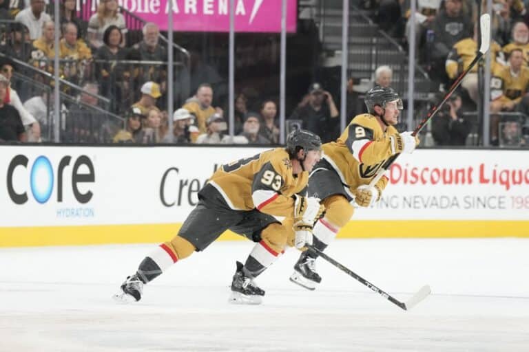 Mitch Marner #93 and Jack Eichel #9 of the Vegas Golden Knights chase after the puck against the Los Angeles Kings.