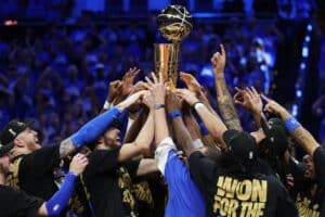The Oklahoma City Thunder celebrate with the Larry O'Brien Championship Trophy after defeating the Indiana Pacers in Game Seven of the 2025 NBA Finals.